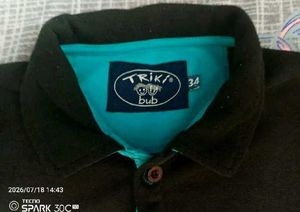 Classic Black Polo Shirt with Teal Accents