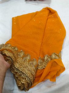 Vibrant Orange Saree with Gold Embroidery