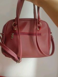 Chic Burgundy Handbag with Bow Accent