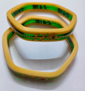 Elegant Bangles with Green Accent