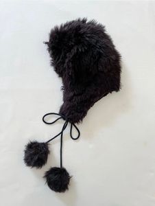 Cozy Faux Fur Trapper Hat with Pom Poms