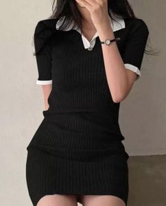 Chic Black Ribbed Polo Dress