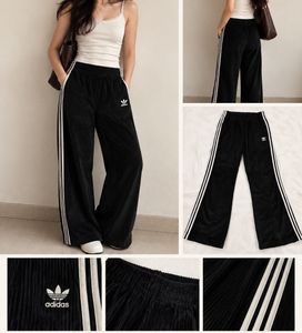 adidas wide leg trousers with backside zip