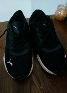 women Puma Black Sneakers with Pink Accents
