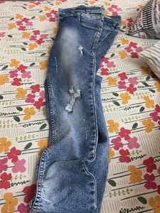 Distressed Blue Denim Jeans