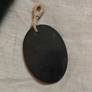carved bone pendant