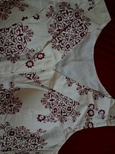 Elegant White Blouse with Maroon Print