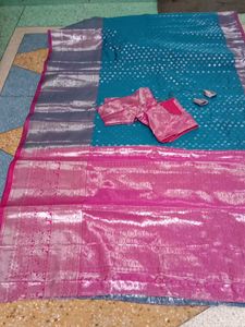 Beautiful Teal Saree with Pink Border