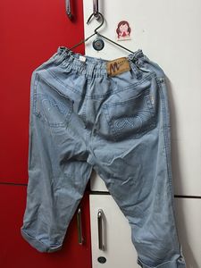 Light Wash Denim Capris with Heart Detail