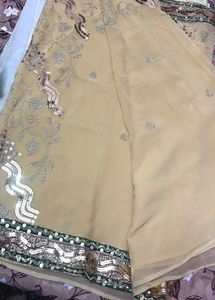 Elegant Cream Saree with Embellished Border
