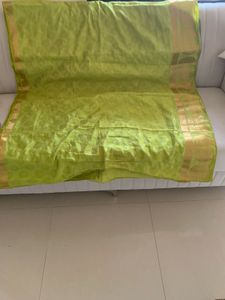 Vibrant Green Silk Saree with Gold Border