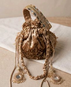 Elegant Embellished  velavte tassels Potli Bag