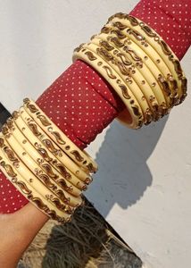 Elegant Cream Bangles with Gold Embellishments