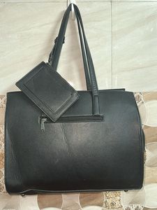 Chic Black Faux Leather Tote Bag with Pouch