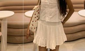 White Tiered Mini Skirt with Lace Trim