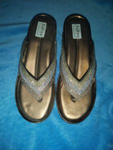 elegant gold sandle with silver and golden stone