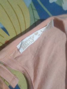 Peach Sleeveless Top with Pocket Detail