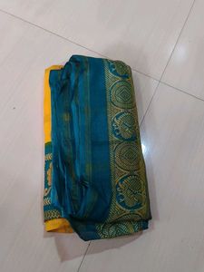 Yellow Saree with Teal Border
