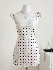 polka dot cream dress