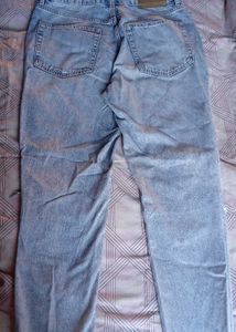 Distressed Light Wash Denim Jeans