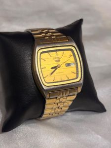vintage seiko 5 and omex wtach