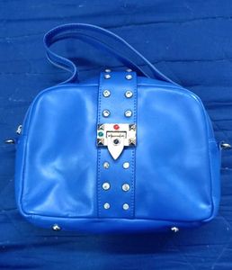 Vibrant Blue Handbag with Embellished Clasp