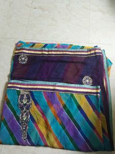 Beautiful Purple Striped Saree with Embellishments