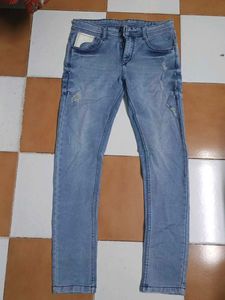 Light Wash Distressed Denim Jeans