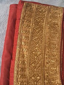 Elegant Red Saree with Gold Border