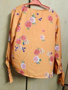 Orange Floral Print Top with Criss-Cross Neckline