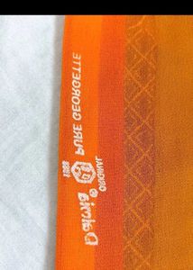Vibrant Orange Saree with Golden Border