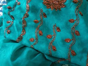Elegant Teal Embroidered Saree