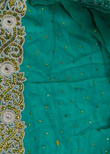 Elegant Teal Embroidered Saree...