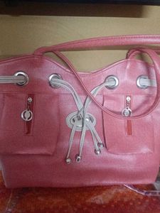 Stylish Pink Handbag with Drawstring Detail
