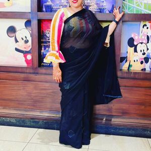 Elegant Black Saree with Unique Blouse