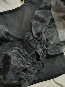 edgy ballon sleeve top with skirt