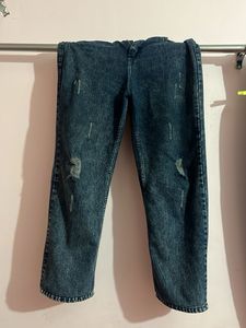 Distressed Blue Denim Jeans