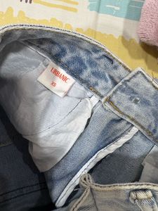 Urbanic Light Wash Ripped Wide Leg Jeans