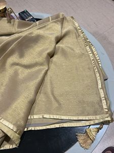 Elegant Golden Saree with Embellishments