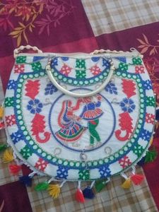 Embroidered Clutch with Tassels