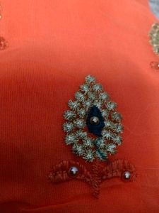 Elegant Orange Embroidered Saree