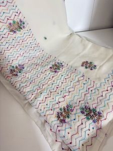 Cream Saree with Colorful Embroidery