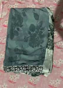 Elegant Floral Print Saree with Polka Dot Blouse