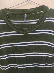 An olive green Sweater top
