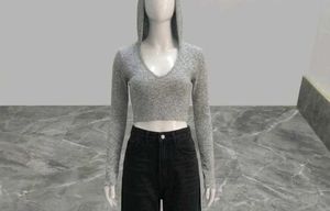 grey cap sweater top