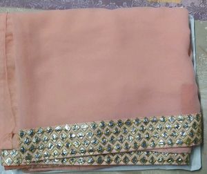 Elegant Peach Saree with Embellished Border