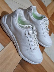 White Skechers Sneakers