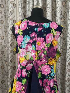 Vibrant Floral Sleeveless Peplum Top