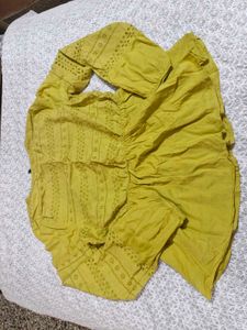 Yellow Eyelet Peplum Top