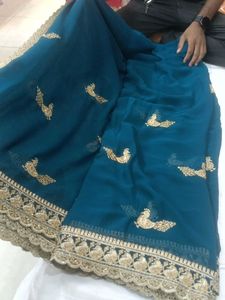 Stunning Teal Saree with Gold Embroidery